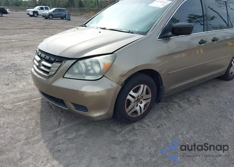 2010 Honda Odyssey Lx z USA, uszkodzony, nr VIN 5FNRL3H26AB097777